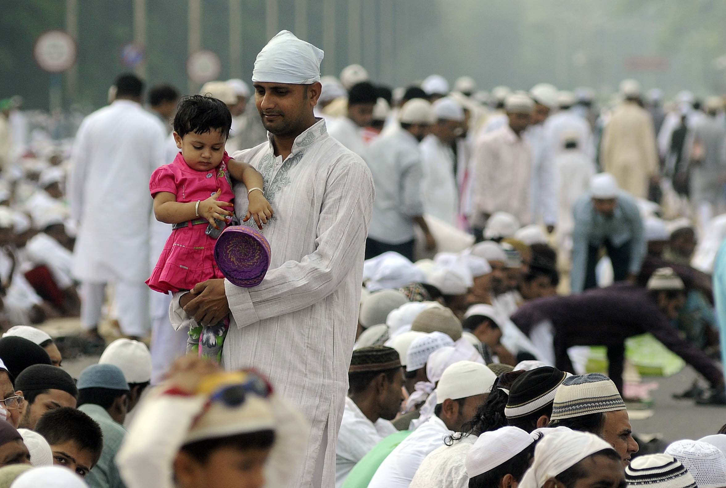 Muslims pray during Eid Al-Adha celebrations 